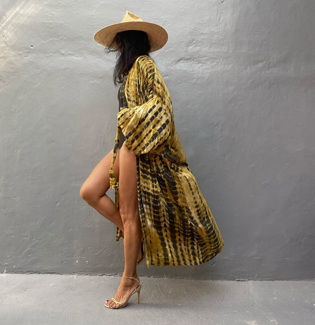 Trenches of Mariana rayon tie-dye beach cover-up with sun protection, loose fit, perfect for women's vacation over swimwear.