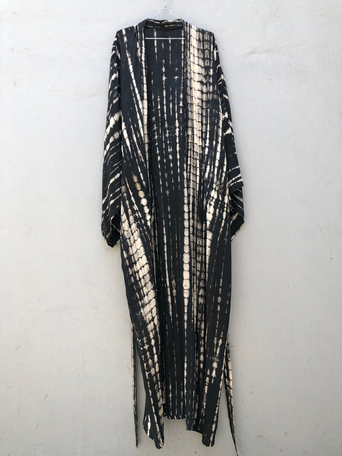 Trenches of Mariana rayon tie-dye beach cover-up with sun protection, loose fit, perfect for women’s vacation and swimwear.