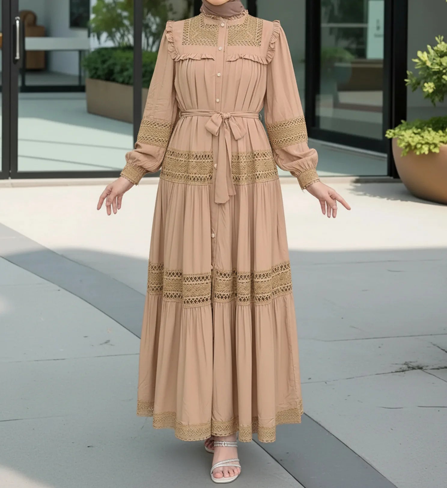 Elegant women's lace Eid dress by Trenches of Mariana, featuring long Moroccan-inspired abaya style with lace-up front.
