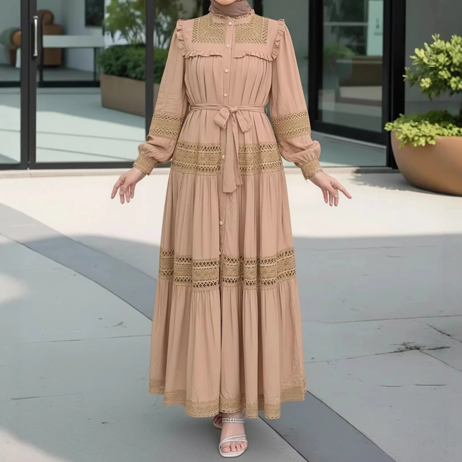 Women’s lace Eid dress by Trenches of Mariana featuring a long Moroccan style abaya with lace-up front and elegant Ramadan design.