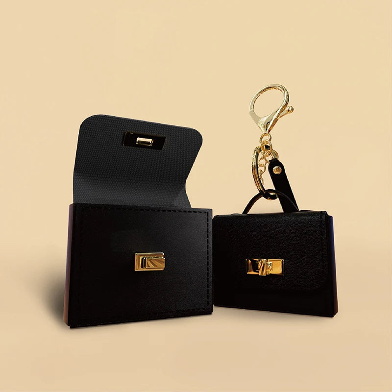 Trenches of Mariana mini bag keychain with coin purse and pendant, versatile fashion accessory with keyring and bag ornament design.