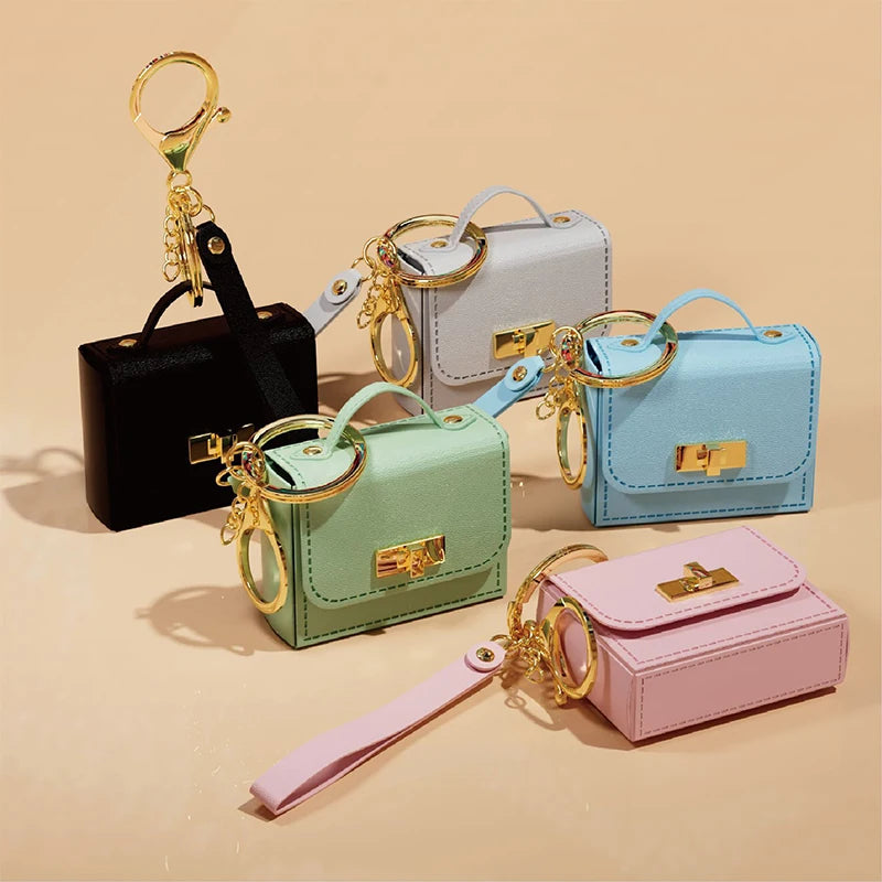 Trenches of Mariana mini bag keychain with coin purse, versatile fashion accessory, and bag ornament featuring a compact design.
