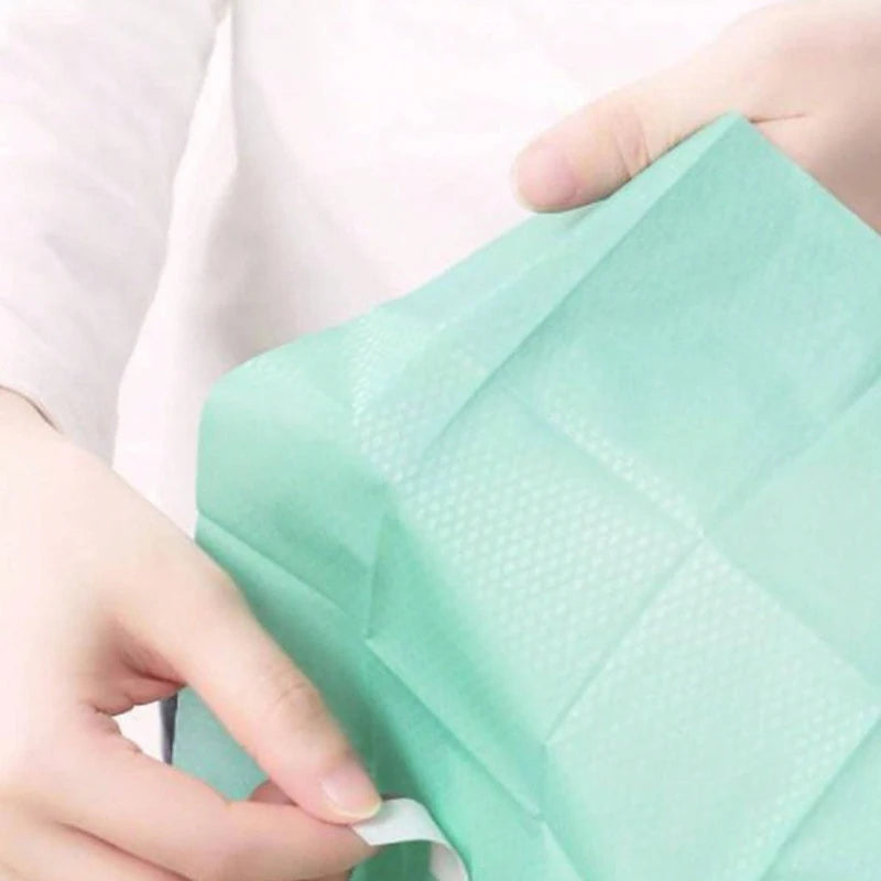 Disposable toilet seat covers by Trenches of Mariana, waterproof paper mats for hotel, travel, or home bathroom use.