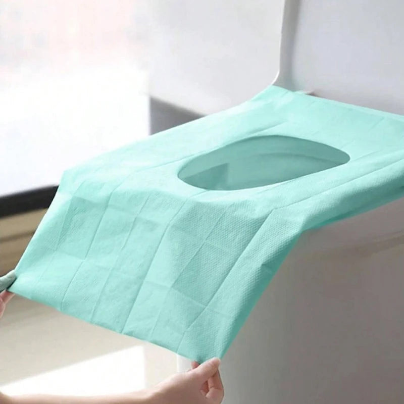 Set of 10 disposable waterproof toilet seat covers by Trenches of Mariana, portable paper mats for travel and home bathroom use.