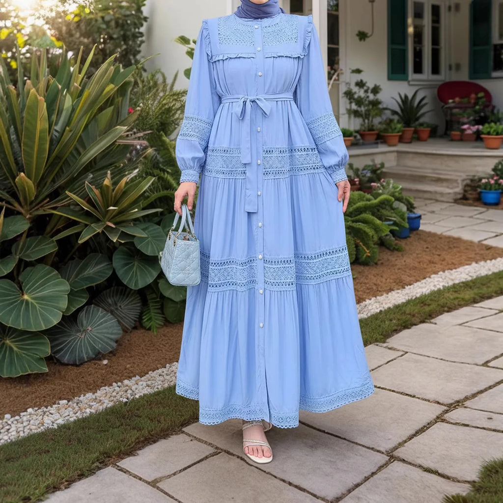 Women’s lace dress by Trenches of Mariana featuring long, elegant Moroccan-inspired Eid abaya with intricate lace details.