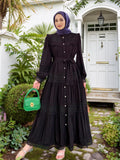 Elegant women’s lace dress by Trenches of Mariana featuring a long Eid Muslim abaya, Moroccan-inspired kaftan style with lace-up front.