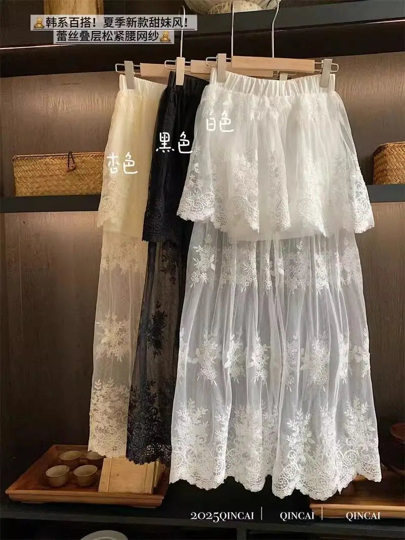 French retro lace skirt for women by Trenches of Mariana, summer 2026 elegant A-line skirt with mesh splicing.