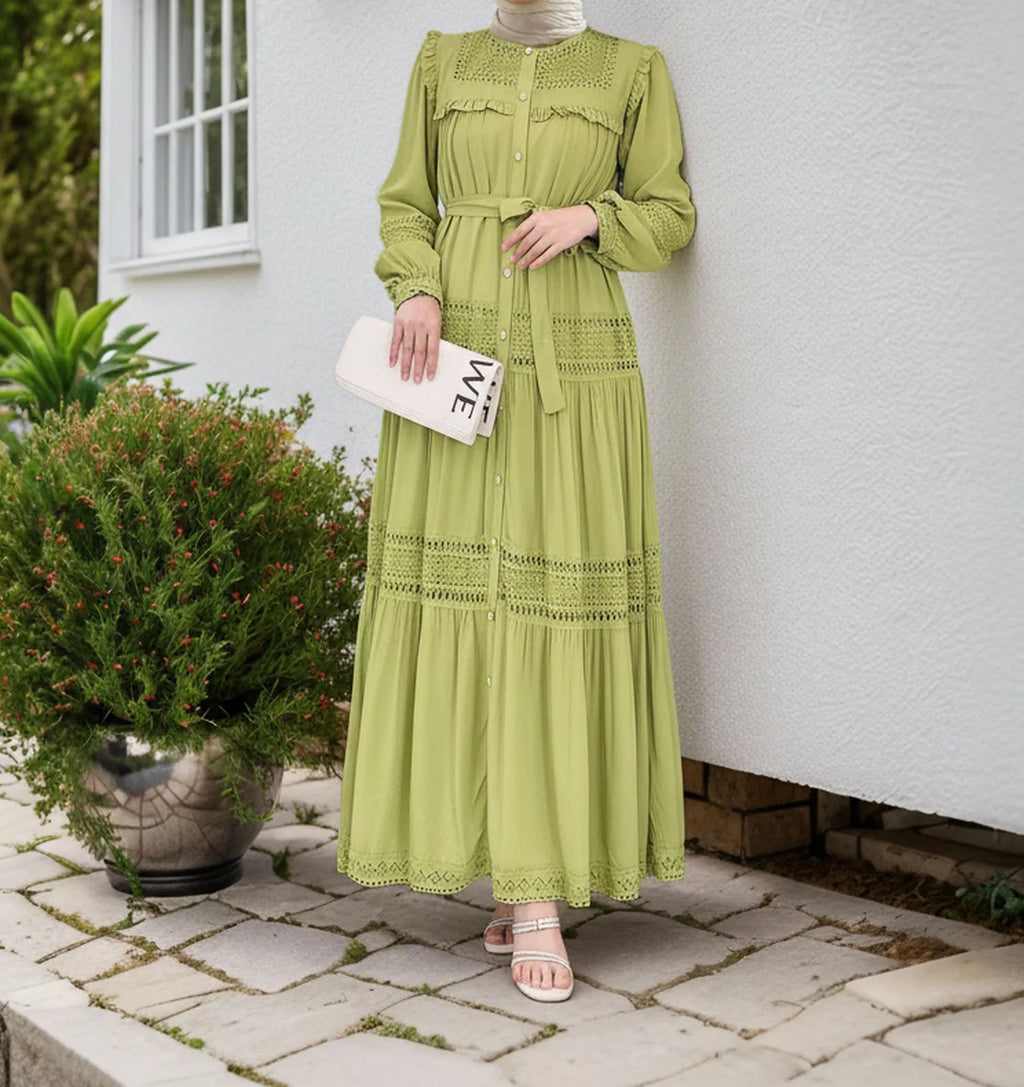 Elegant women’s lace dress by Trenches of Mariana, featuring long, intricate lace details and a modest, flowing design for Ramadan.