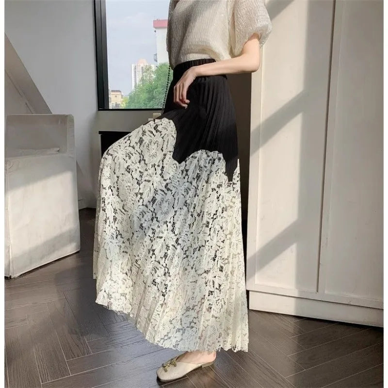 Long high-waist French lace stitched pleated skirt for women, summer cover-up by Trenches of Mariana, stylish and breathable.
