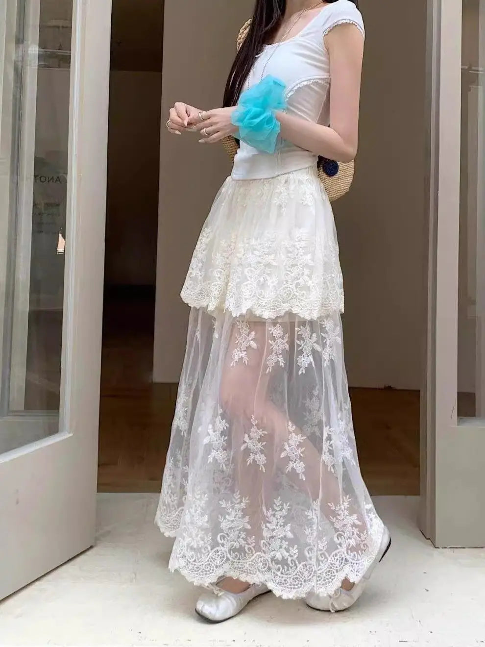 French retro lace skirt for women by Trenches of Mariana, summer 2026 elegant A-line skirt with mesh splicing detail.