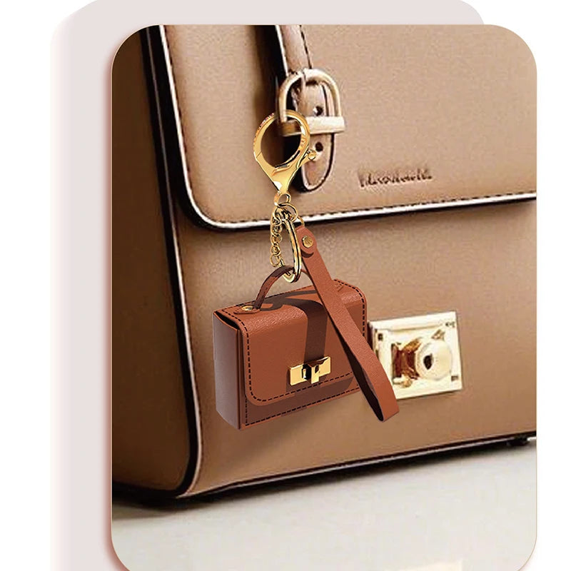 Trenches of Mariana mini bag keychain coin purse with versatile pendant, featuring a stylish accessory for keys and bags.