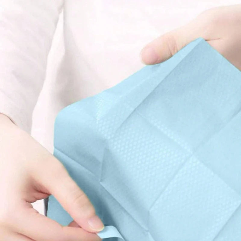 Disposable toilet seat covers by Trenches of Mariana, waterproof and portable paper mats for hotel, travel, and home bathroom use.