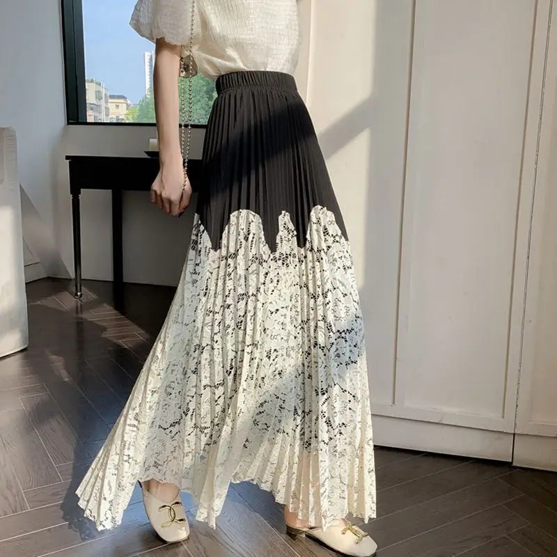 Long high-waist summer pleated skirt with French lace stitching for women, stylish cover-up from Trenches of Mariana.