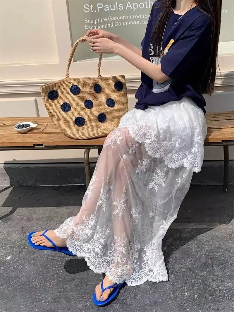French retro lace skirt for women by Trenches of Mariana, summer 2026 elegant A-line skirt with mesh splicing details.