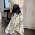 Trenches of Mariana women's French lace stitching pleated summer skirt with high waist and long cover-up design, styled for warm weather.