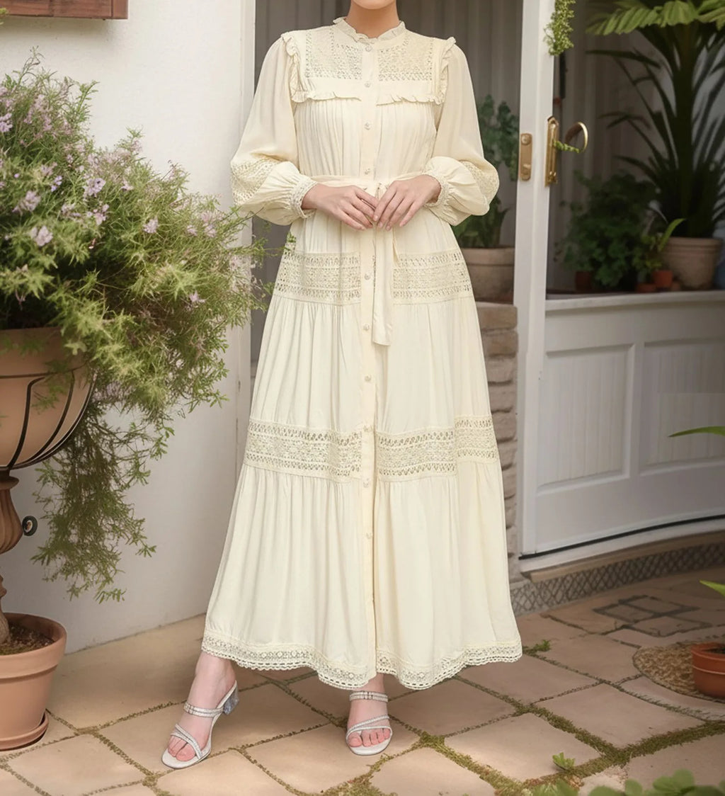 Elegant women's lace Eid dress by Trenches of Mariana, featuring long Moroccan-inspired design with lace details and a single-breasted style.