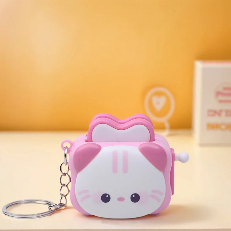 Cute bread machine panda keychain by Trenches of Mariana, a creative cartoon accessory for stress relief and small gifts.