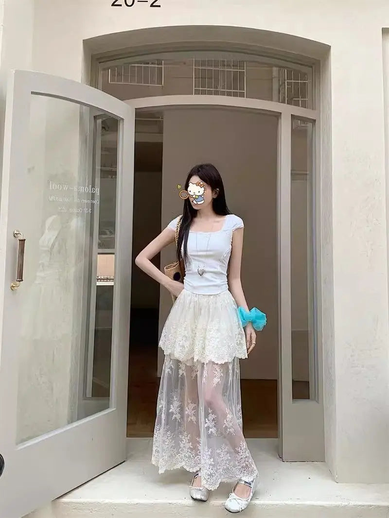 French retro lace skirt for women by Trenches of Mariana, summer 2026 elegant A-line skirt with mesh splicing and lace details.