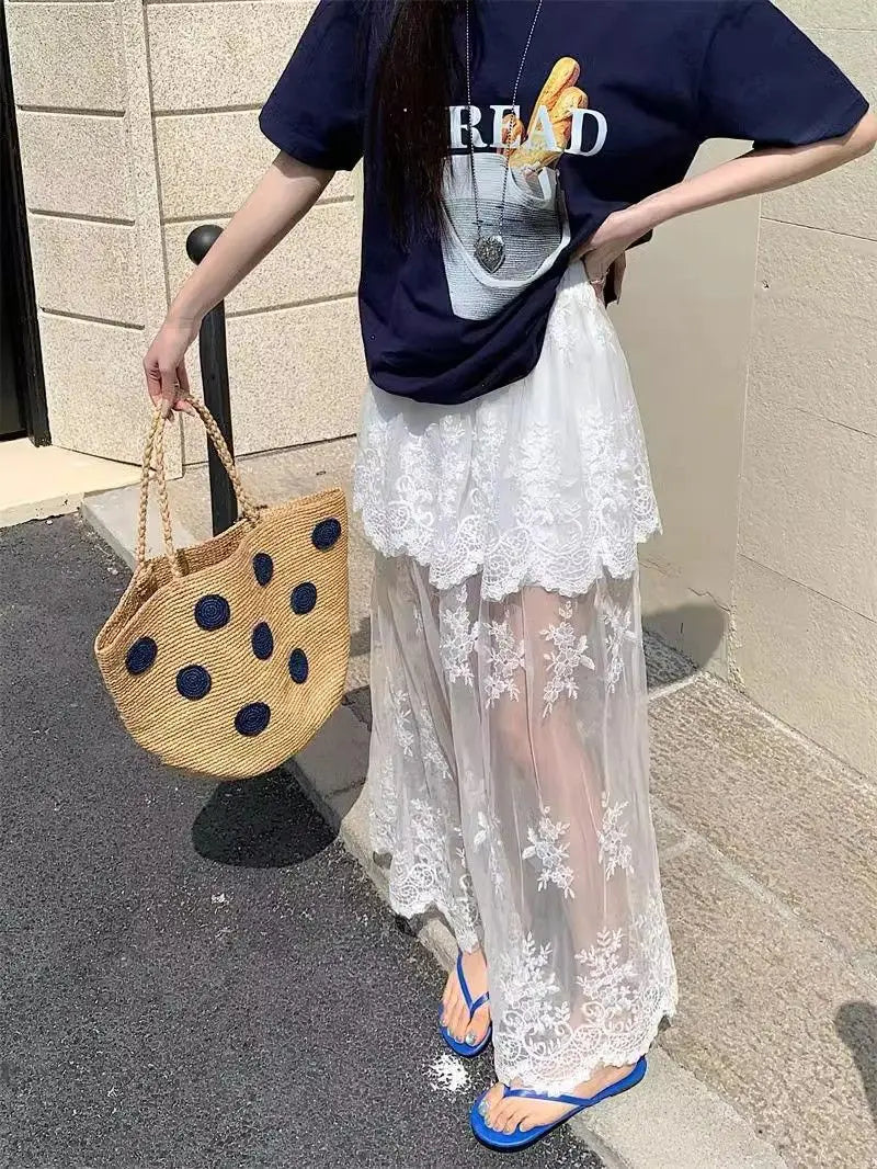 Elegant French retro lace A-line skirt for women featuring mesh splicing, ideal for summer 2026 fashion by Trenches of Mariana.