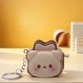 Cute panda bread machine keychain by Trenches of Mariana, a charming stress-relief accessory and small cartoon gift.