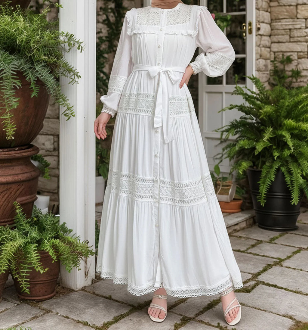 Women’s lace Eid dress by Trenches of Mariana featuring long Moroccan-inspired abaya style with lace-up front and elegant design.