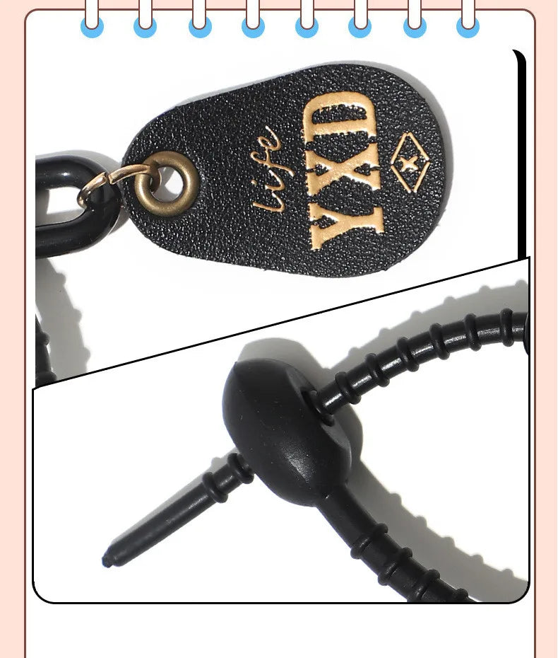 Pink heart-shaped leather car keychain with personalized face design, suitable for men and women, by Trenches of Mariana.