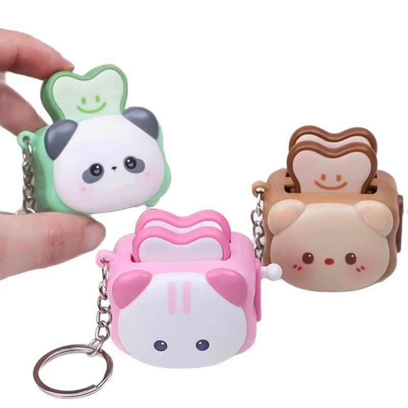Trenches of Mariana cute panda bread machine keychain with cartoon design, stress-relieving accessory, small gift, and detailed craftsmanship.