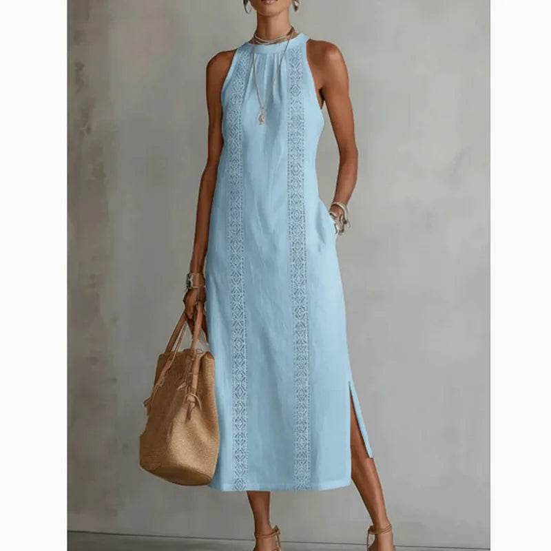 Elegant white lace slit dress by Trenches of Mariana featuring sleeveless cotton and linen fabric with a round neck and A-line silhouette.