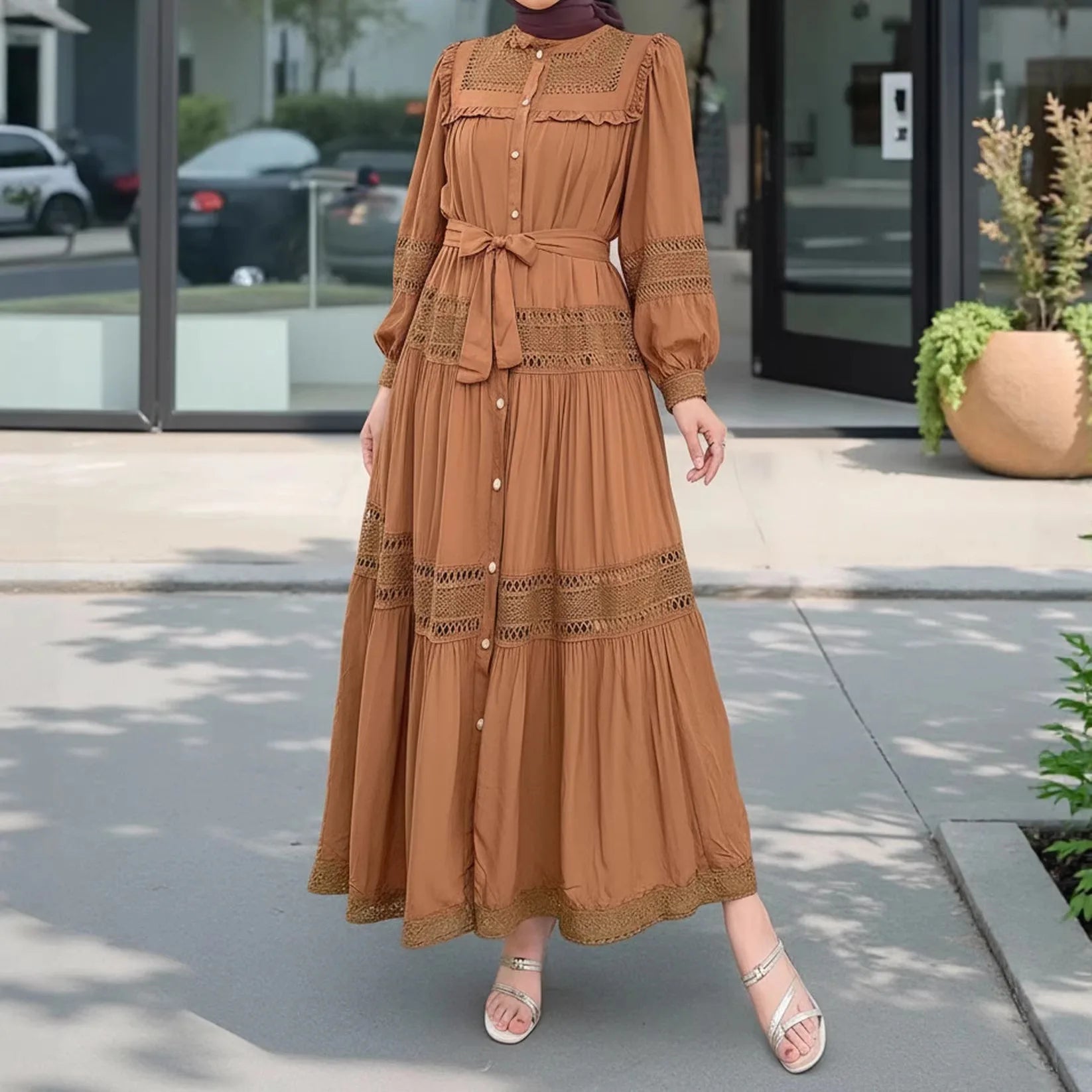 Women’s lace dress from Trenches of Mariana featuring long, elegant Eid Muslim abaya with lace-up front and intricate detailing.
