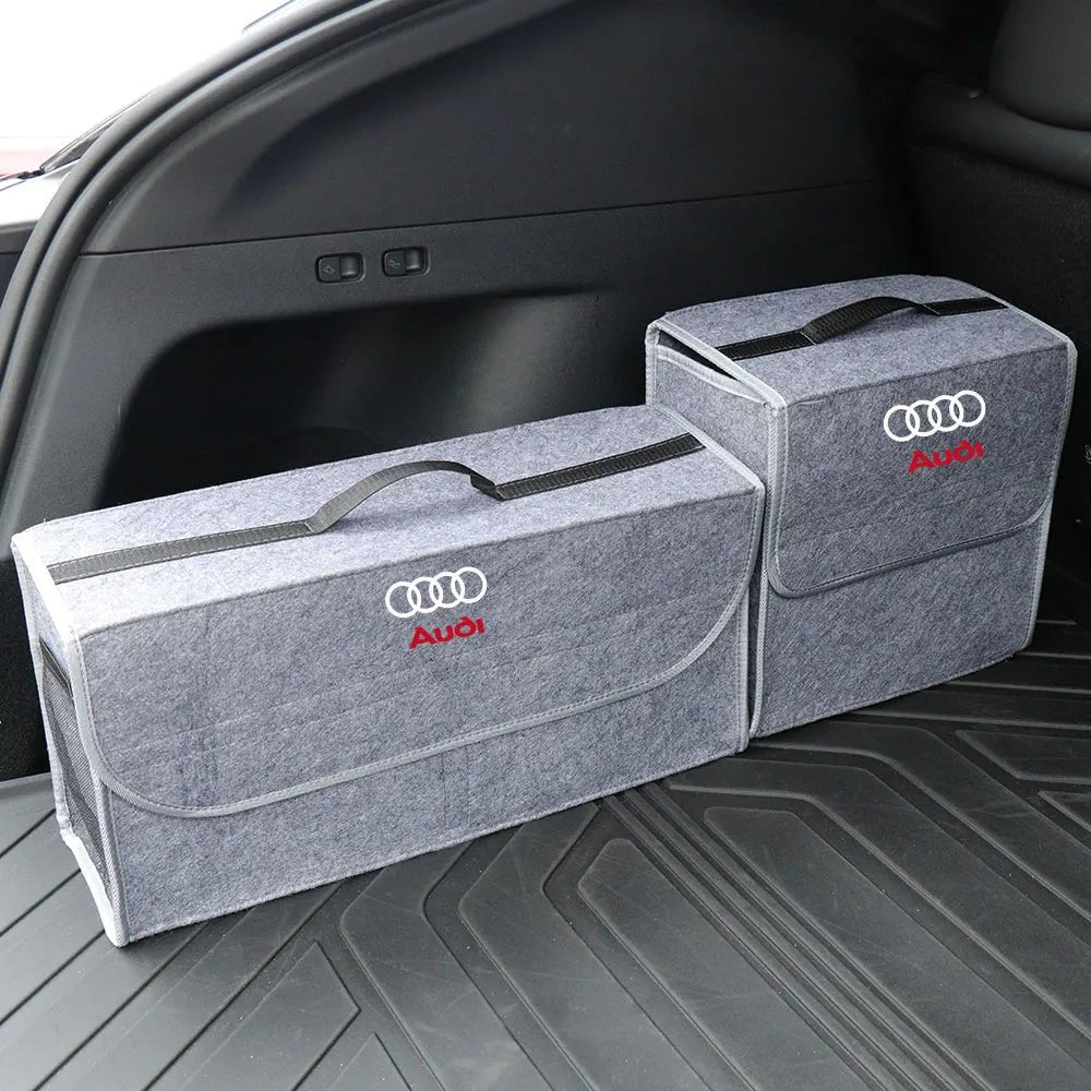 Trenches of Mariana car logo storage organizer with compartments for storing small items inside a vehicle.