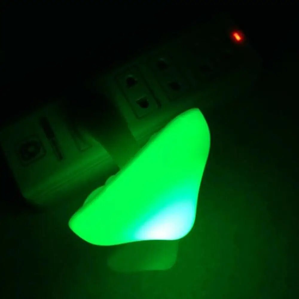 Trenches of Mariana night light in the shape of a mushroom, glowing softly with warm light for a cozy night ambiance.