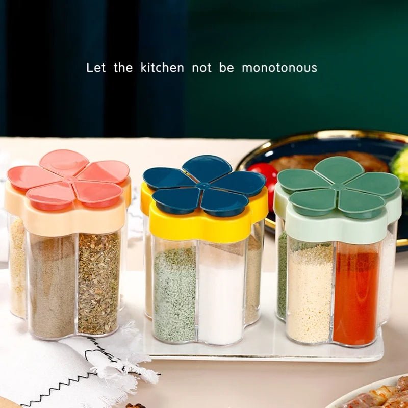 Trenches of Mariana miscellaneous organizer jar with a clear glass body and metal lid for storing small household items.