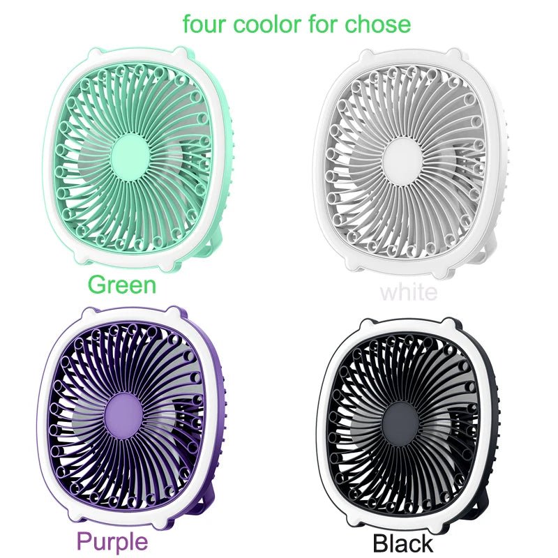 Trenches of Mariana portable mini fan on a desk, compact and lightweight with adjustable settings for personal cooling.