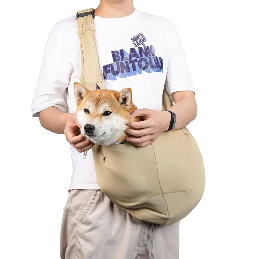 Trenches of Mariana puppy sling carrier bag with adjustable strap and breathable fabric for comfortable pet transportation