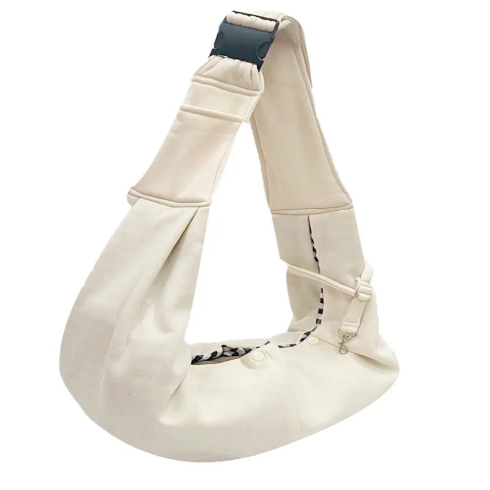 Trenches of Mariana puppy sling carrier bag with adjustable strap and breathable fabric, designed for comfortable pet carrying.