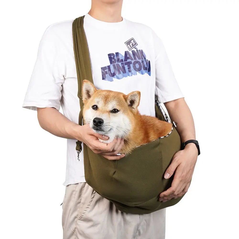 Trenches of Mariana puppy sling carrier bag with adjustable strap and soft fabric, designed for comfortable pet transport.