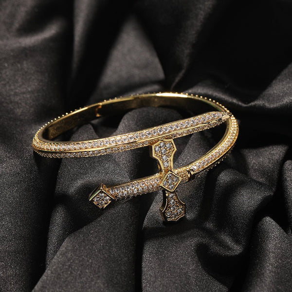 Copper inlaid Zircon Sword of Justice bracelet by Trenches of Mariana, featuring a detailed sword design and sparkling gemstones.