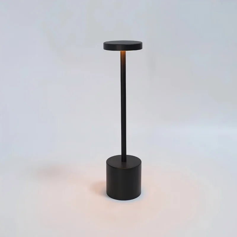 Modern Trenches of Mariana touch control lamp with sleek design and illuminated touch surface for easy lighting adjustment.